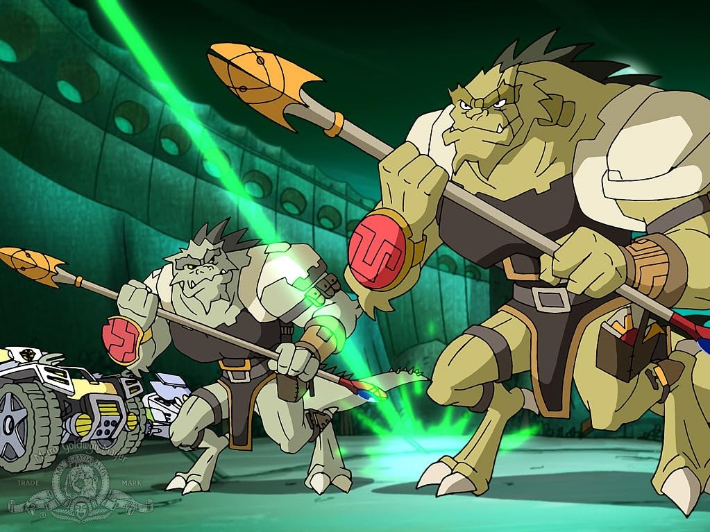 Image of some Tlak'kahn warriors from Stargate Infinity holding staff weapons similar to those used by Jaffa warriors