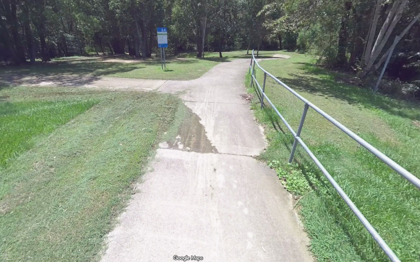 Image showing a moderately wide concrete pathway with no separation on it