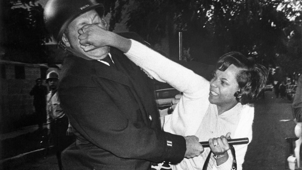 Pamela Echols defends herself from a police attack