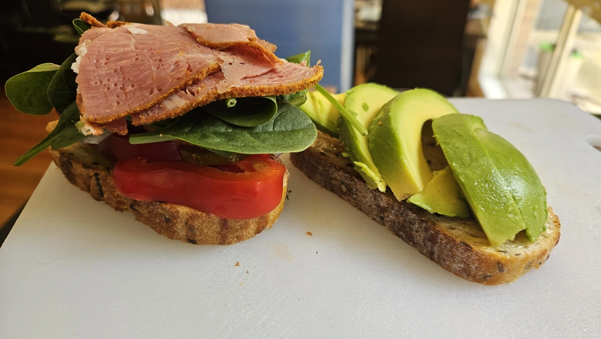 Open-faced toasted pastrami sandwich